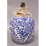 A 19th century Chinese blue and white jar converted to a table lamp, height 22cm excl. fittings
