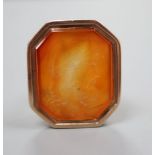 A late Georgian yellow metal and carnelian intaglio seal, 3.2cm