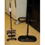 A painted cast iron stick stand, H.60cm together with a boot brush stand