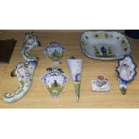 A group of Rouen faience wall pockets, a shoe, a mouse mug and a large dish, width 29cm