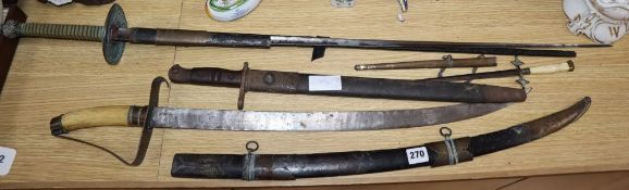 A bone-handled sword, a French epee, a Remington bayonet and a dagger