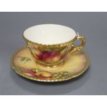 A Royal Worcester fruit painted cup and saucer, saucer signed L K Till, cup signed A Kendry
