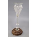 A facet cut glass vase on wooden base, total height 37cm