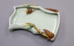 A Chinese celadon glazed 'snail' brush washer