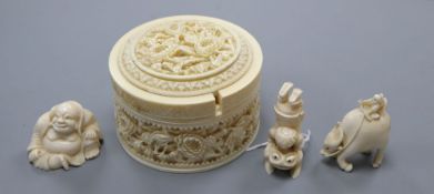 An early 20th century Chinese ivory box and three ivory figures