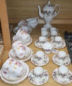 A Royal Crown Derby 'Derby Posies' 25-piece part tea service and a Wedgwood 'Hathaway Rose' part