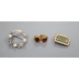 A Regency yellow metal seed pearl mourning brooch, a pair of 9ct garnet ear studs and a brooch