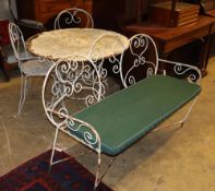 A circular metal garden table, a pair of matching chairs and a bench seat, bench W.130cm, D.56cm,