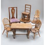 Eight pieces of miniature furniture including three tables, three chairs and chair-cum-step-ladder