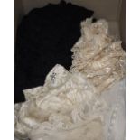 An Edwardian ladies lace blouse, a black bobbin lace shawl, a cream silk machine lace shawl and