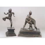 Two Malay bronzes of wrestlers and a juggler, height 21cm