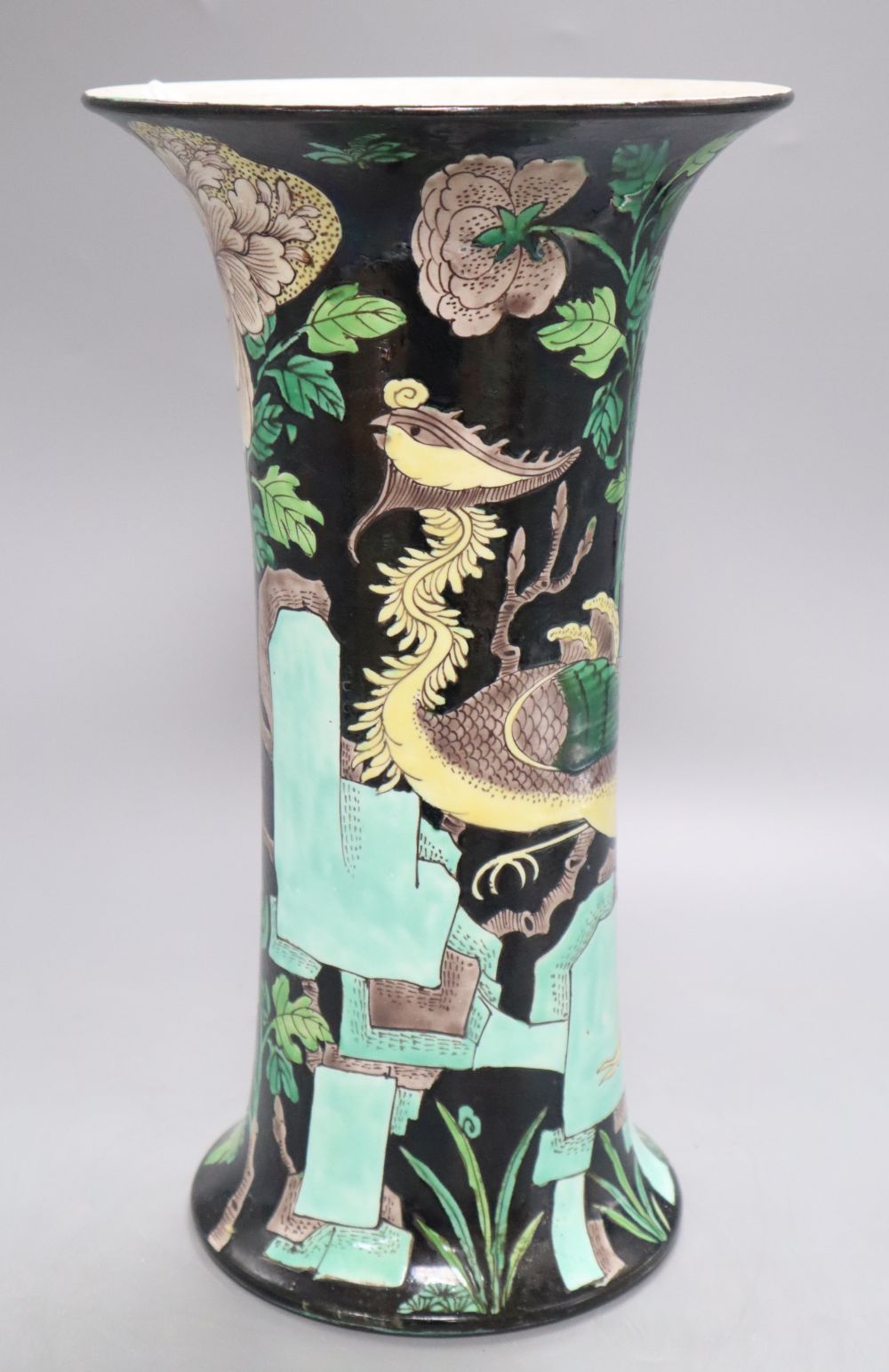 A 19th century Chinese famille noir beaker vase, height 33cmCONDITION: There are two hairline cracks