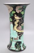 A 19th century Chinese famille noir beaker vase, height 33cmCONDITION: There are two hairline cracks