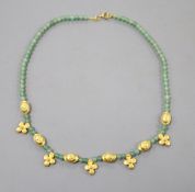 A Chinese yellow metal and quartz? bead necklace, 42cm, gross 17.5 grams.