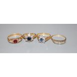 Four assorted 18ct gold and gem set dress rings, including Edwardian red stone(chipped) and