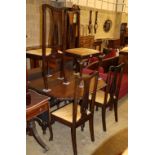 A 1920's oak gateleg dining table, W.150cm extended, together with a set of four Art Nouveau style