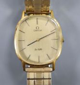 A gentleman's 1980's steel and gold plated Omega De Ville manual wind wrist watch, on associated