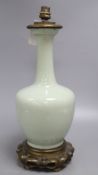 A Chinese celadon vase, mounted in bronze as a lamp, height 39cmCONDITION: Please note that there is