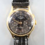 A gentleman's 1060's? 18k Coresa chronograph manual wind wrist watch, on later strap.CONDITION: Case