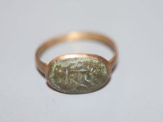 An antique base metal and bronze ring, with monogram, size P,