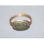 An antique base metal and bronze ring, with monogram, size P,