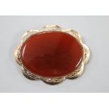 A modern 9ct gold and carnelian set oval brooch, 59mm, gross 24.9 grams.