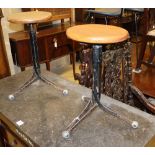 A pair of mid century design oak and wrought iron adjustable typists' stools, seat diameter 30cm