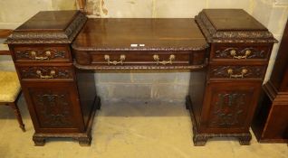 A late Victorian mahogany twin pedestal sideboard, W.187cm