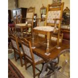 An 18th century design oak draw leaf dining table, 260cm extended, W.91cm, H.79cm and six chairs (