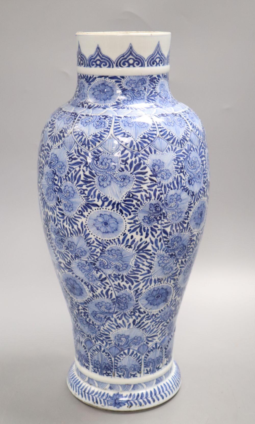 A large Chinese Kangxi blue and white vase, height 41cmCONDITION: This has been split into two