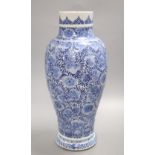 A large Chinese Kangxi blue and white vase, height 41cmCONDITION: This has been split into two