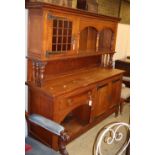 An Arts & Crafts oak raised back sideboard, W.176cm, D.54cm, H.185cm