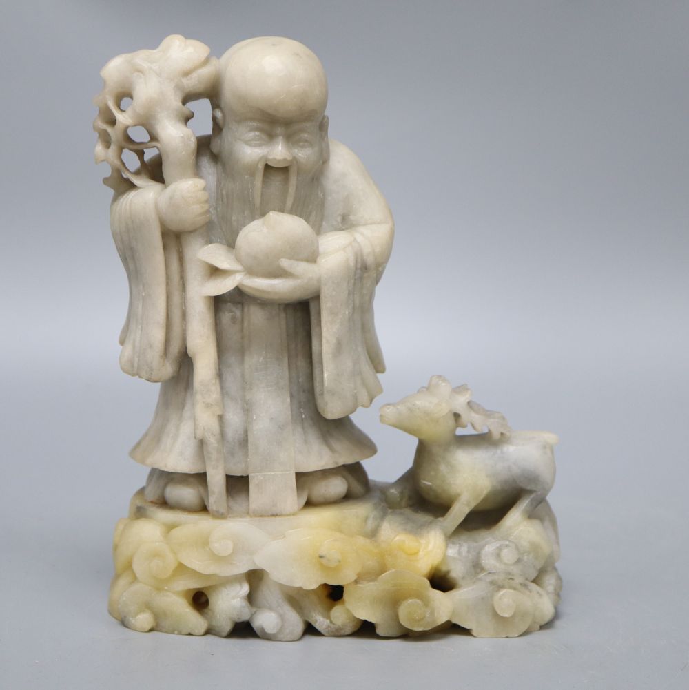 A Chinese carved soapstone figure of a sage, height 23cm