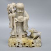 A Chinese carved soapstone figure of a sage, height 23cm