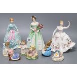 Three Royal Doulton porcelain figures and six Beswick, Doulton and Beatrix Potter figures