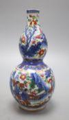 An 18th century Chinese clobbered double gourd vase, 19.5cm highCONDITION: Shallow chipping