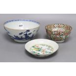A Chinese blue and white bowl, a famille rose bowl and a famille verte saucer, largest diameter
