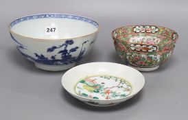 A Chinese blue and white bowl, a famille rose bowl and a famille verte saucer, largest diameter