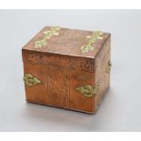 A copper brass mounted miniature casket, width 10cm height 9cm