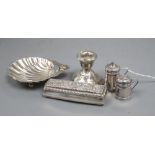 Minor silver including shell butter dish, two condiments, a dwarf candlestick and repousse box.