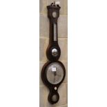 A Victorian rosewood wheel barometer, H.100cmCONDITION: There are multiple splits and cracks to