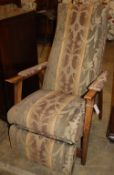 A Grieves & Thomas Bodyline beech reclining chair