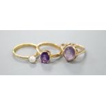 An 18ct gold and pearl ring, gross 2.6 grams, a pale amethyst and 9ct gold ring, gross 3.7 grams and
