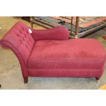 A Victorian style red upholstered buttoned back chaise longue, W.137cm