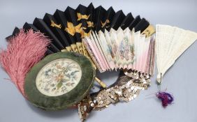 An 18th century circular framed embroidery, worked with chenille and pearls, a brise fan, two