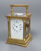 A brass cased repeating carriage clock, height with handle down 15cm