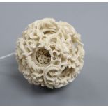 A 19th century carved ivory concentric ball, diameter approx. 7.5cm