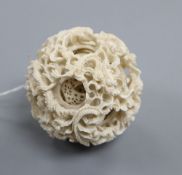 A 19th century carved ivory concentric ball, diameter approx. 7.5cm