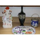 A Stone China strainer, a Staffordshire Highlander group, a Royal Doulton vase and a Wedgwood