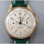 A gentleman's 1950's? 18k Norina chronograph manual wind wrist watch, on later strap.CONDITION: Case